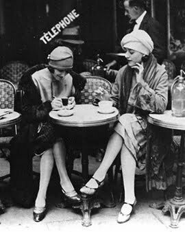 two 1920s women chatting