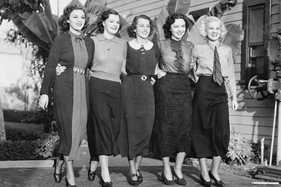 Five women with skirts