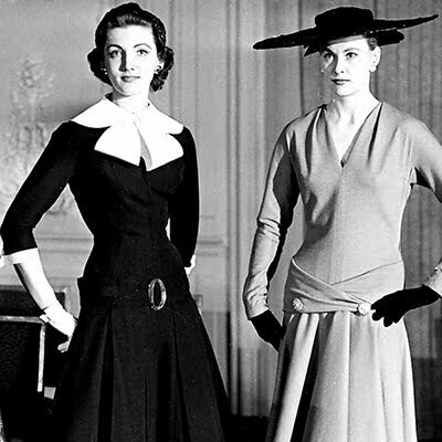 two women with dresses