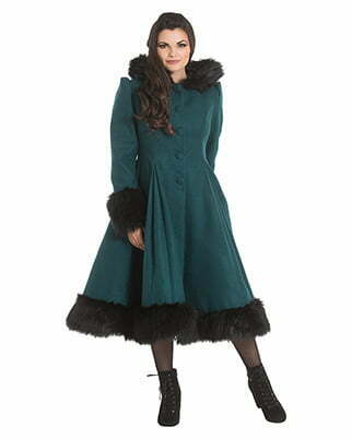 a woman with green fur coat