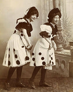 two women with polkdot dresses