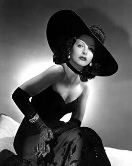 a woman with black hat